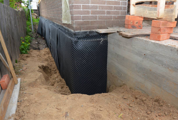 SJ Waterproofing Pros technician performing targeted Vapor Barrier Installation assessment in Retsof, NY